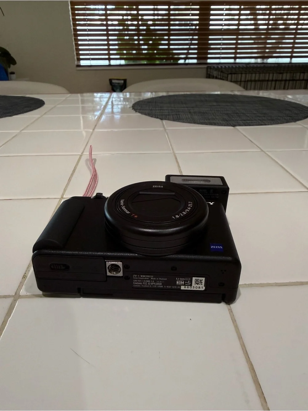 Sony Black Compact Digital Camera with Detachable Flash and Pink Strap